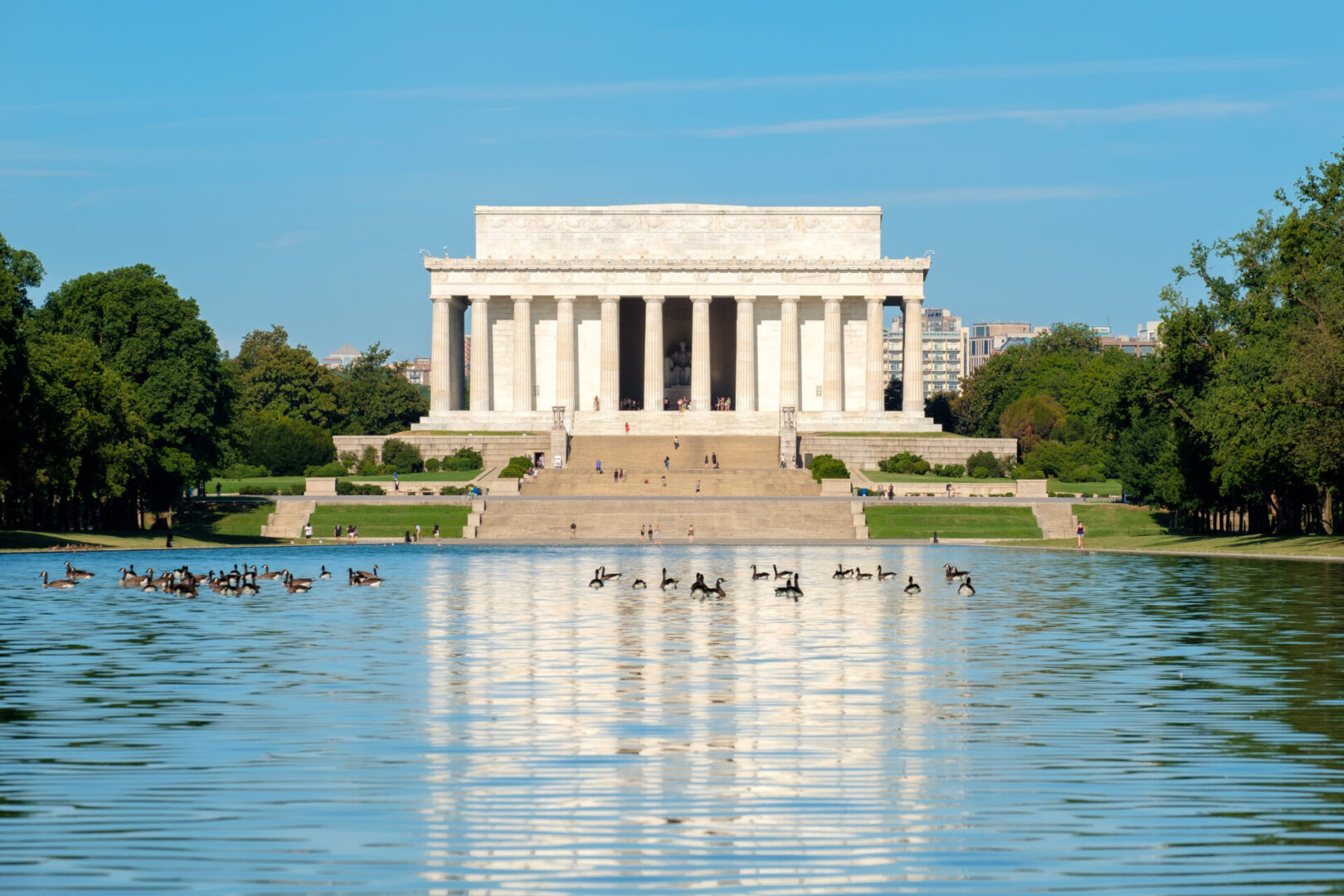 A view of the lincoln memorial from across the water.